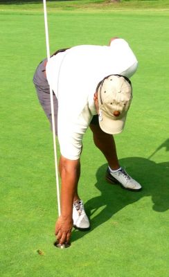 Gregg retrieves his Hole-In-One on #8
Hole #8, 188 yrds, 4 iron, July 13, 2013
